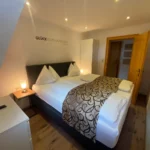 ferienwohnung mit hund bad gastein schlafzimmer doppelbett grossglockner